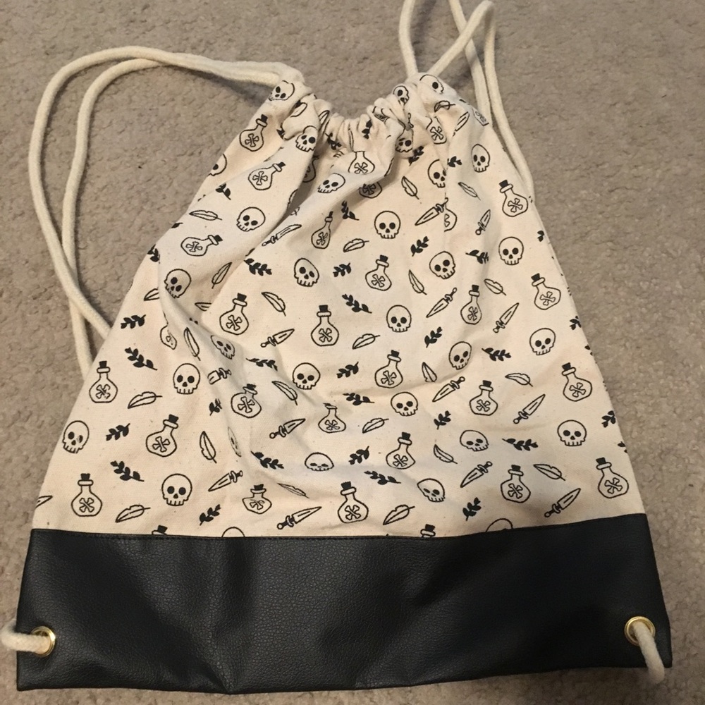 Owlcrate drawstring backpack skulls potion dagger